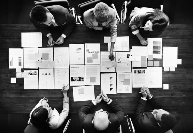 buisness people analyzing statistics financial concepts