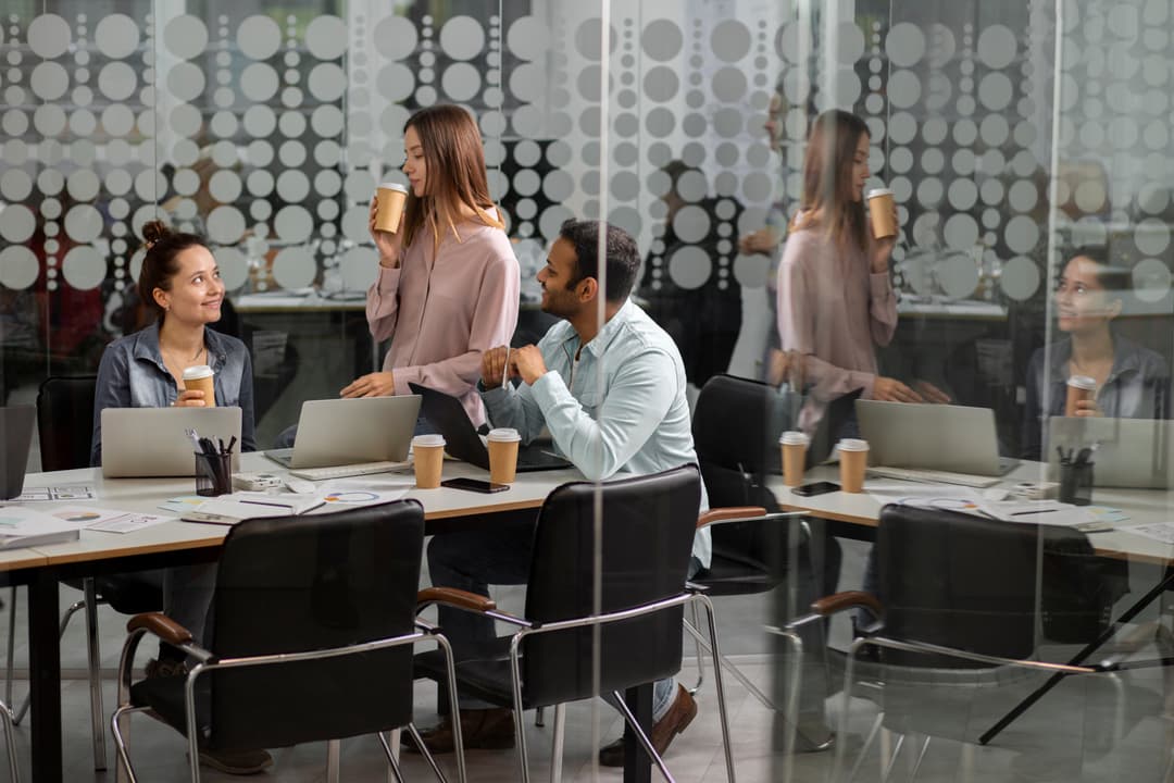 people pointing to a graph.